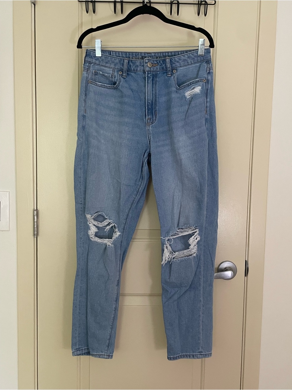 American Eagle light wash distressed mom jeans